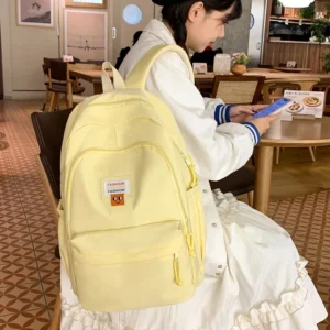 Milk-yellow backpacks for women are simple and versatile with large capacity high school students backpack backpack